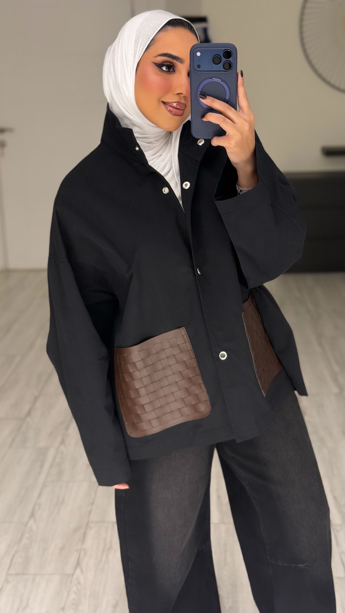 Black jacket - brown leather pockets